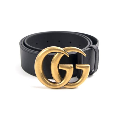 black leather and gold gucci belt|Gucci belt with black buckle.